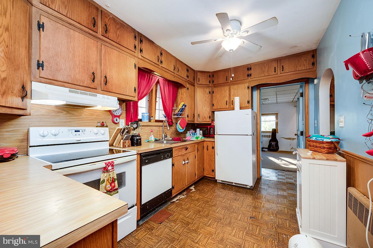 3424 Fremont Street Reading, PA 19605 - Photo 12 of 51 a kitchen with stainless steel appliances granite countertop a refrigerator a stove and a sink