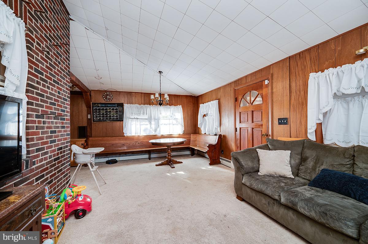 3424 Fremont Street Reading, PA 19605 - Photo 22 of 51 a living room with furniture and a flat screen tv