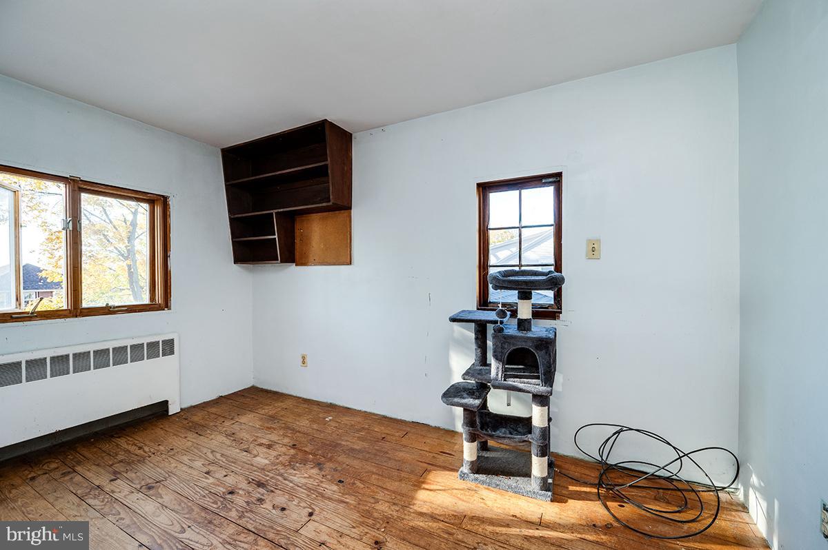 3424 Fremont Street Reading, PA 19605 - Photo 34 of 51 a view of a livingroom with furniture hardwood floor and workspace