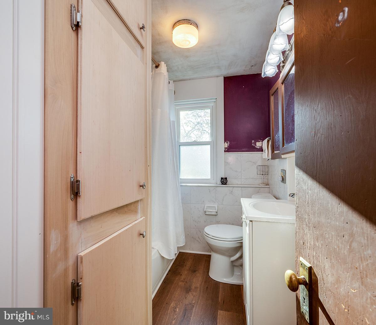 3424 Fremont Street Reading, PA 19605 - Photo 36 of 51 a bathroom with a sink a toilet and mirror