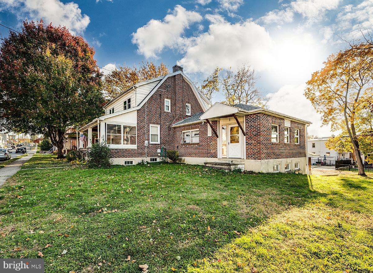 3424 Fremont Street Reading, PA 19605 - Photo 51 of 51 a front view of a house with a garden