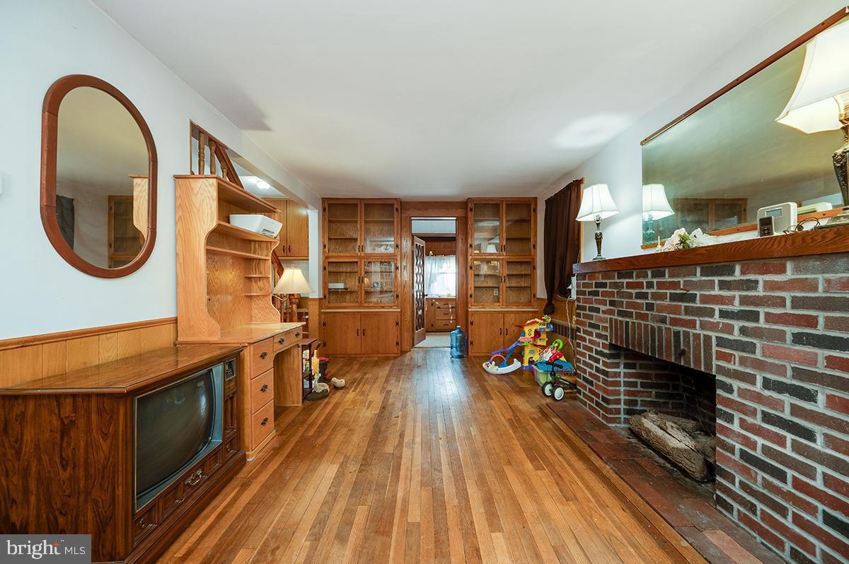 3424 Fremont Street Reading, PA 19605 - Photo 8 of 51 a kitchen with stainless steel appliances granite countertop a stove and a wooden floors