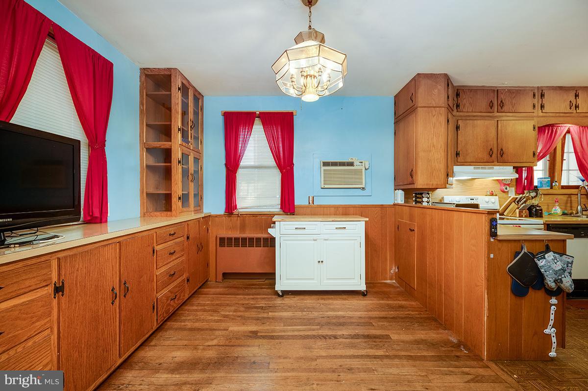 3424 Fremont Street Reading, PA 19605 - Photo 10 of 51 a kitchen with stainless steel appliances wooden cabinets and a sink