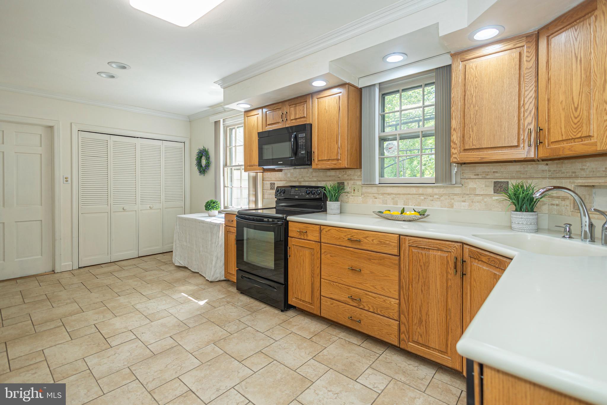 2316 Shipley Road Wilmington, DE 19803 - Photo 12 of 42 a kitchen with a sink cabinets and window