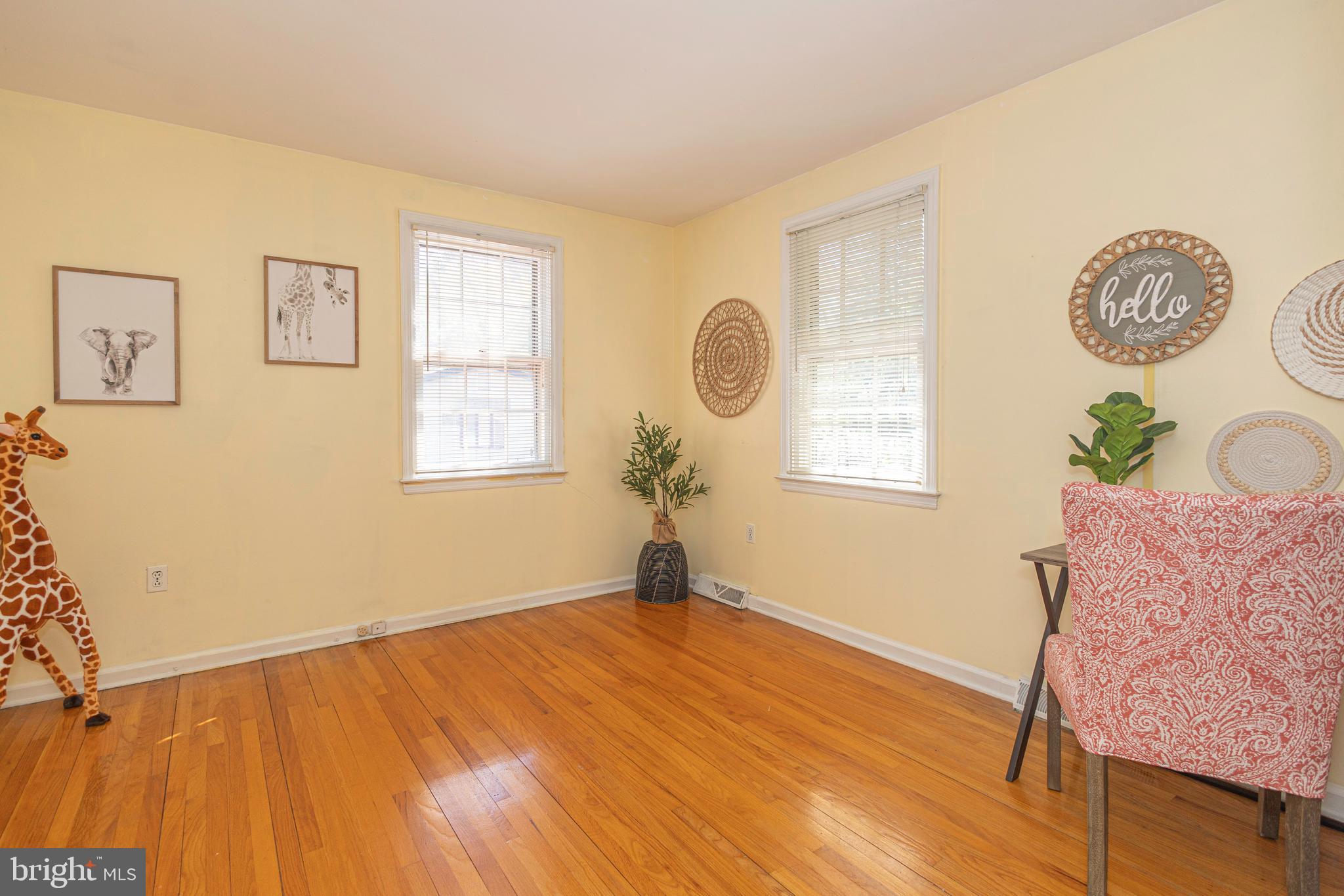 2316 Shipley Road Wilmington, DE 19803 - Photo 21 of 42 a view of a room with wooden floor and windows
