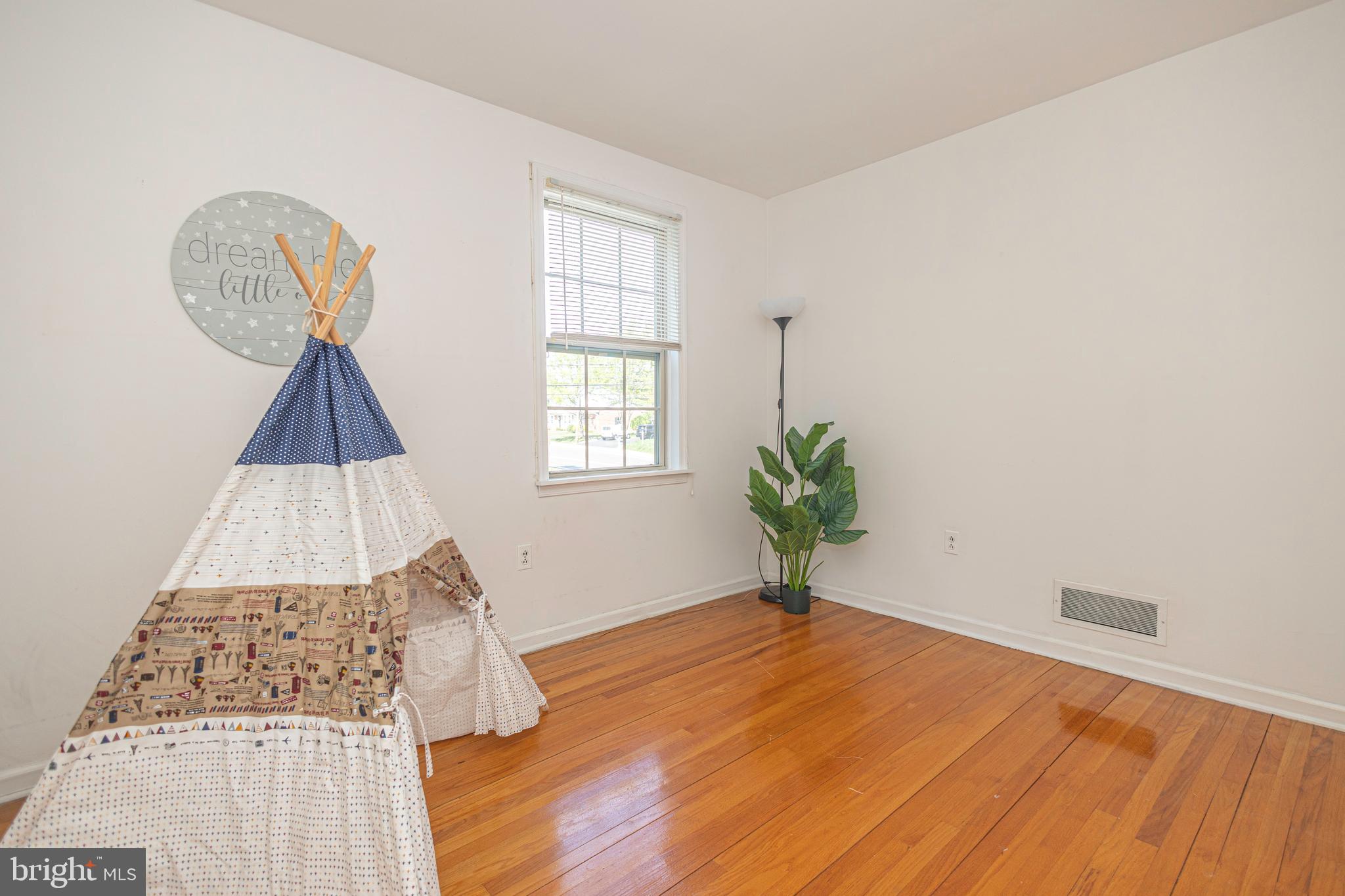 2316 Shipley Road Wilmington, DE 19803 - Photo 24 of 42 wooden floor in an empty room with a window