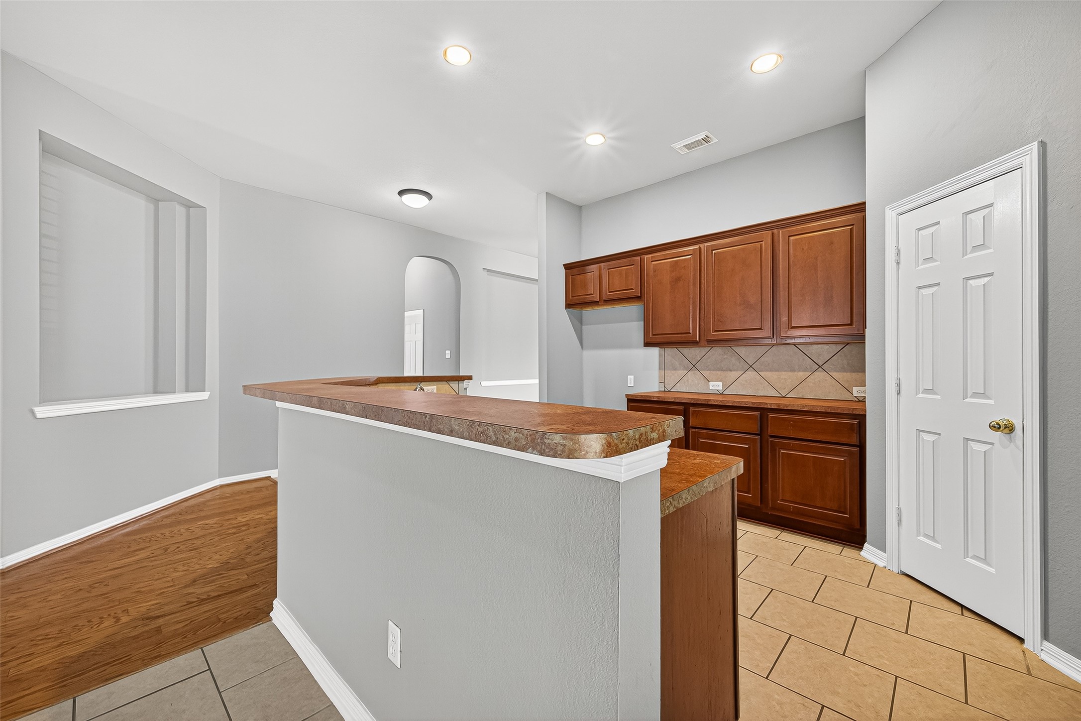 17230 Valhallah Way Houston, TX 77095 - Photo 25 of 48 a kitchen with stainless steel appliances granite countertop a refrigerator and a stove top oven