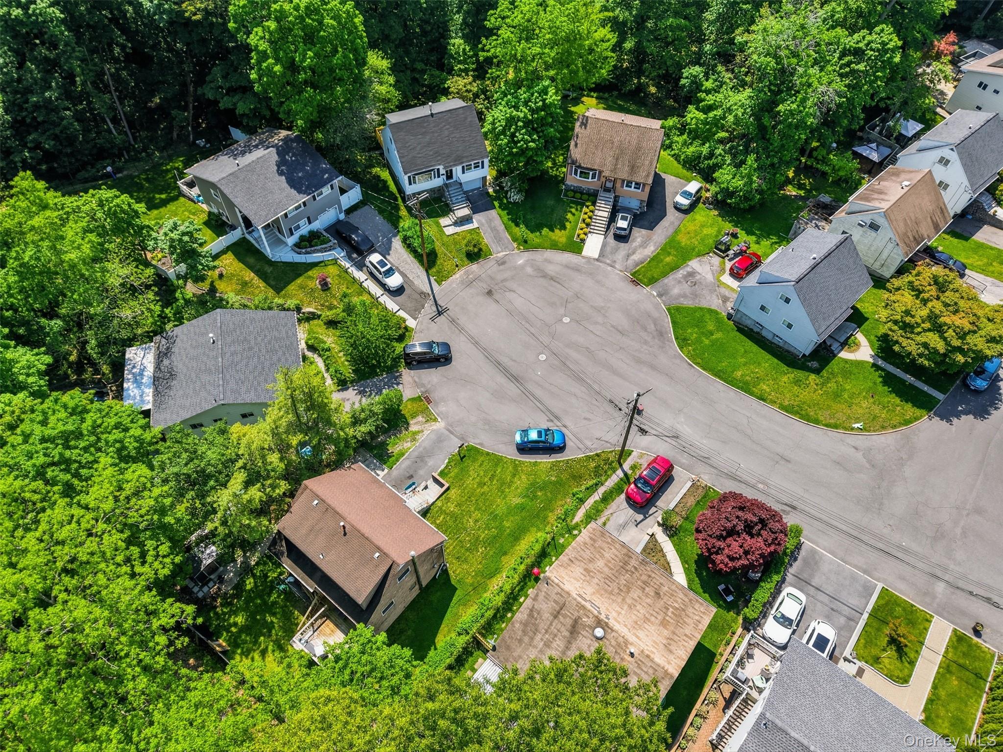24 Fuller Road Ossining, NY 10562 - Photo 42 of 48 an aerial view of a house with a garden