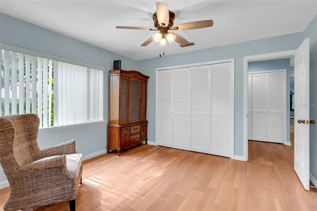 a view of livingroom with furniture and chandelier fan