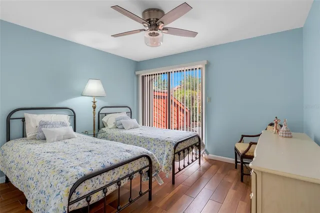 a bedroom with a bed and a table