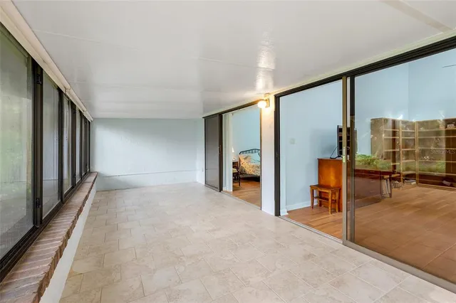 a view of an entryway with a floor to ceiling window