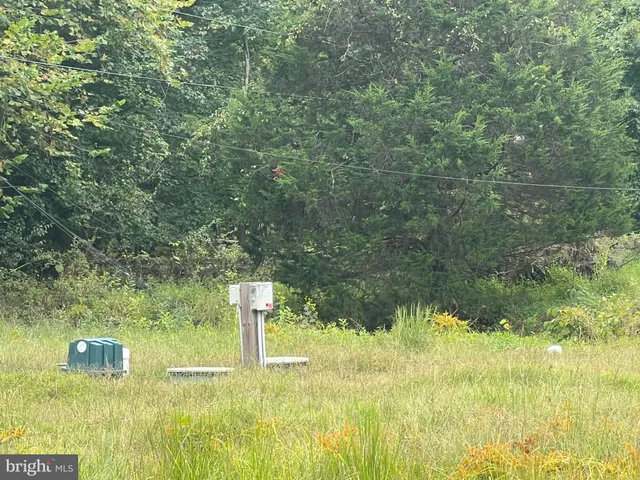 a view of a lake view with a big yard