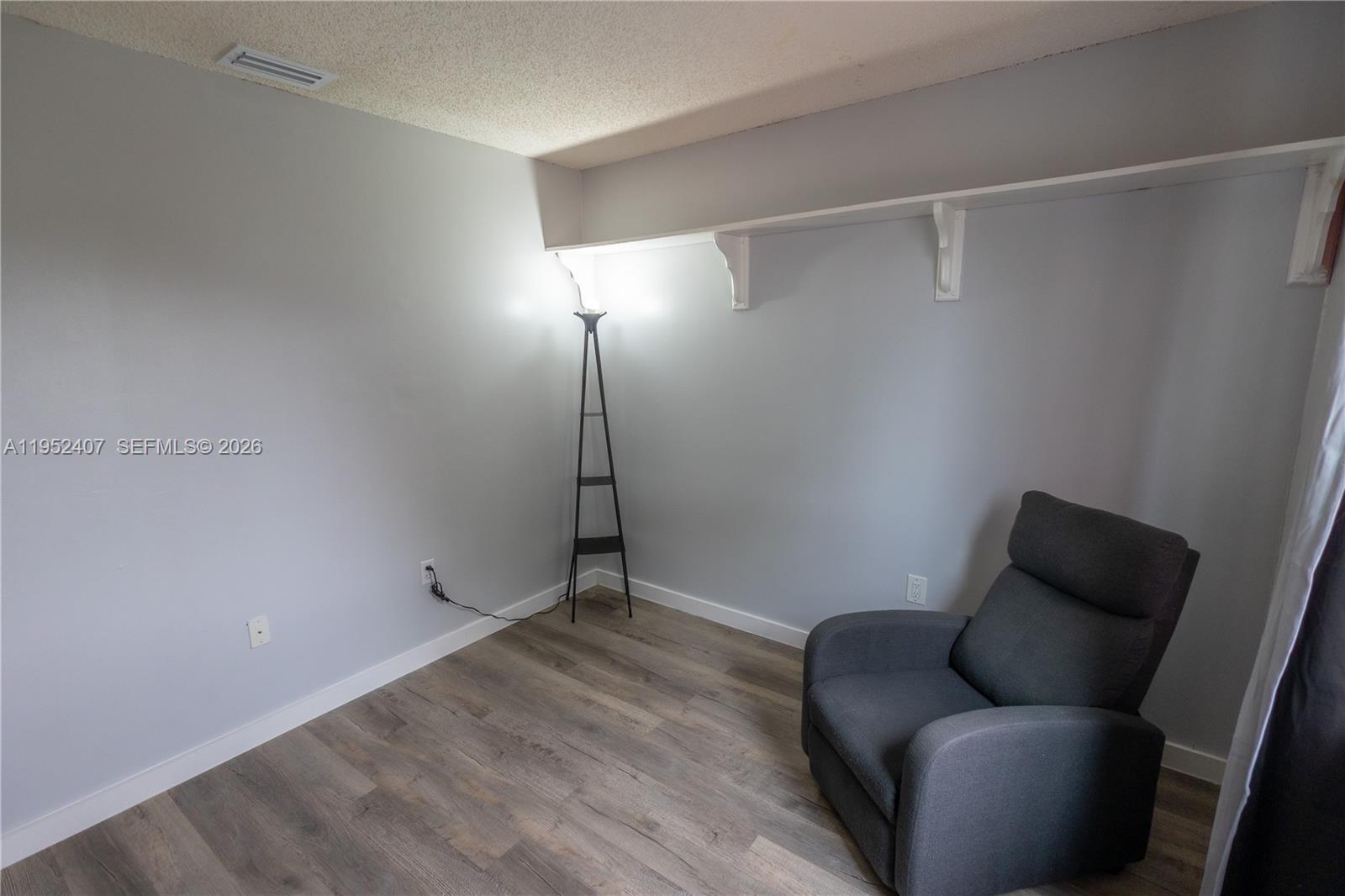 16831 Southwest 139th Place Miami, FL 33177 - Photo 22 of 39 a living room with furniture