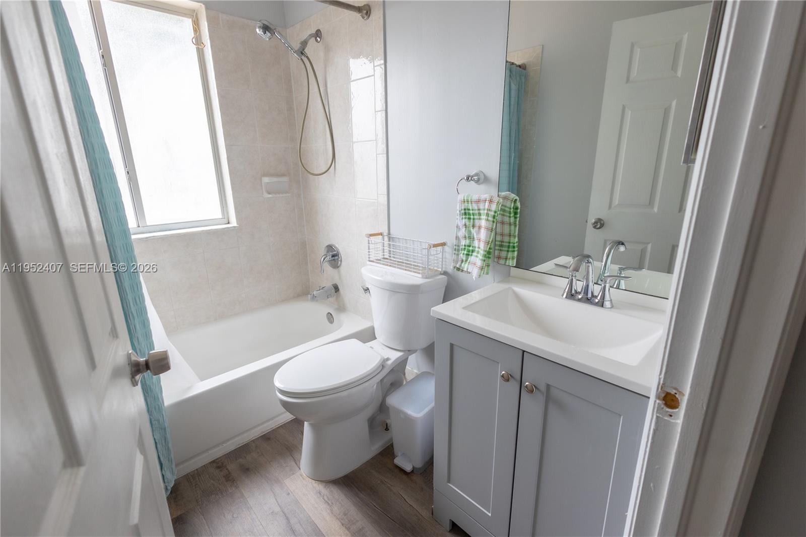 16831 Southwest 139th Place Miami, FL 33177 - Photo 31 of 39 a bathroom with a sink toilet and shower