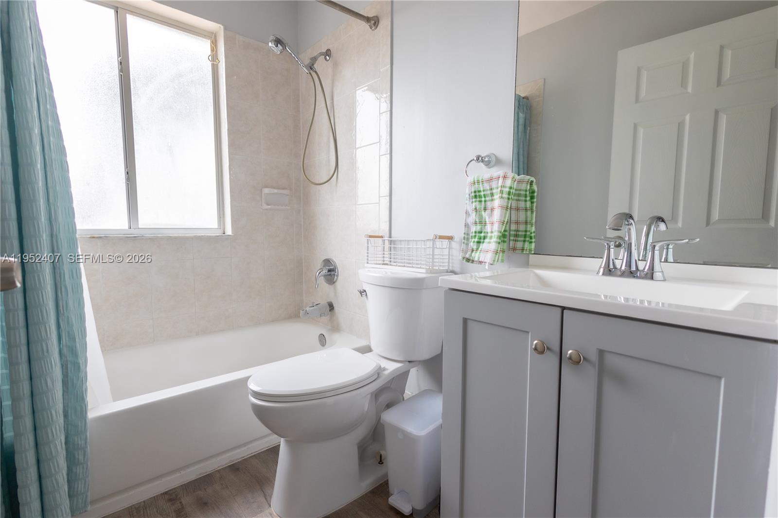 16831 Southwest 139th Place Miami, FL 33177 - Photo 32 of 39 a bathroom with a sink toilet and shower