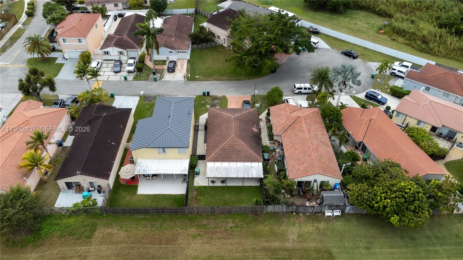 16831 Southwest 139th Place Miami, FL 33177 - Photo 37 of 39 an aerial view of houses with yard