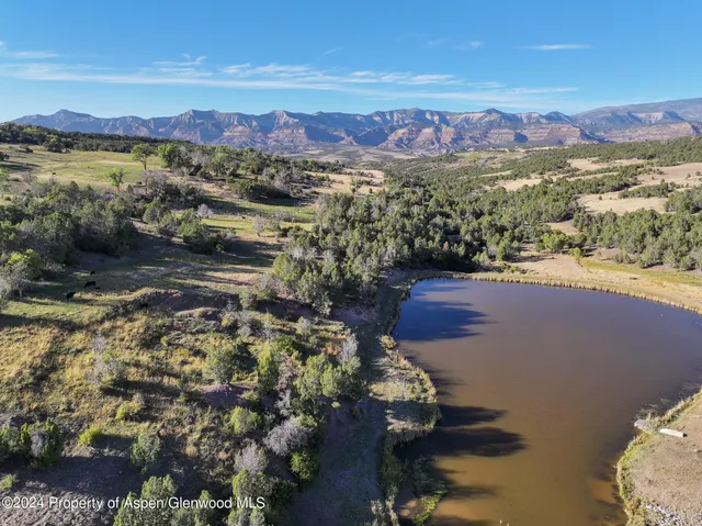 a view of a city with mountains in the background