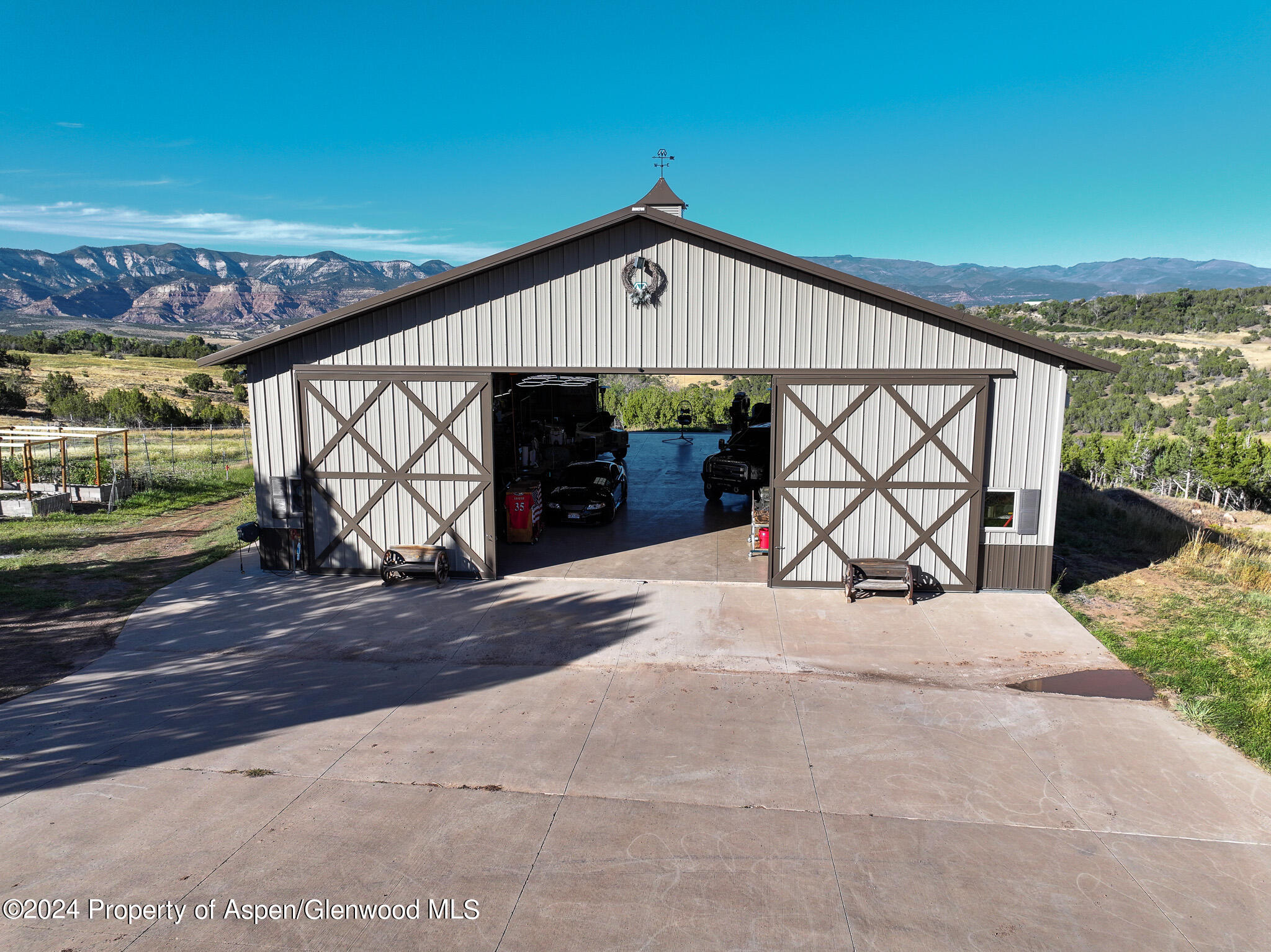 56106 Me Road Collbran, CO 81624 - Photo 9 of 34 a view of a terrace with a patio