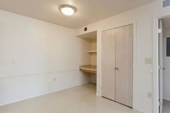 a bathroom with a shower and a toilet