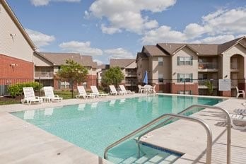 1 Chapelridge Circle Marion, IA 52302 - Photo 8 of 12 a view of a swimming pool with outdoor seating