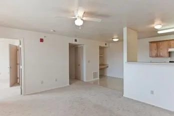 a view of an empty room with a bathroom