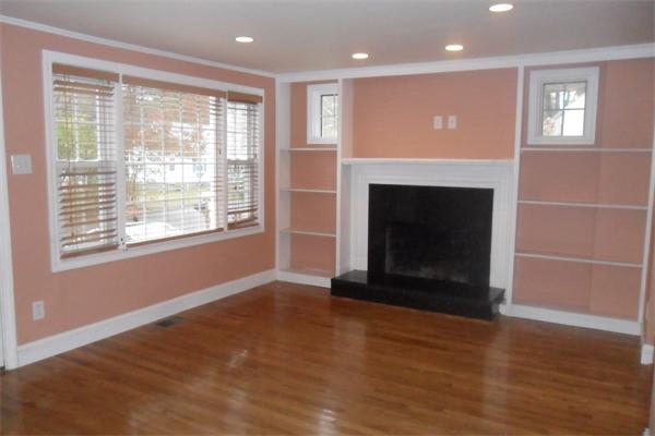 30 Adams Road Ashland, MA 01721 - Photo 3 of 20 a view of an empty room with wooden floor and a window