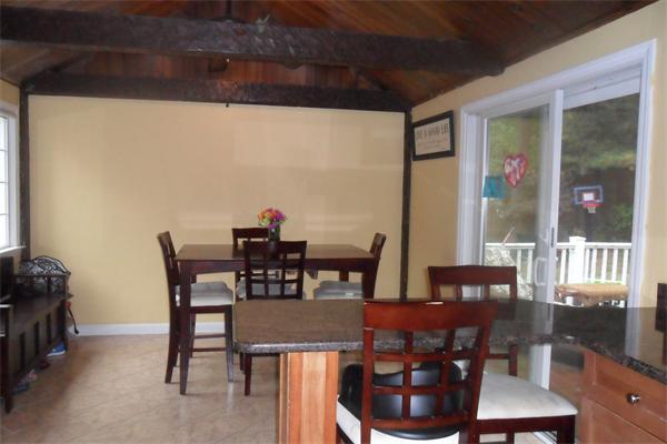 30 Adams Road Ashland, MA 01721 - Photo 10 of 20 a view of a dining room with furniture window and outside view