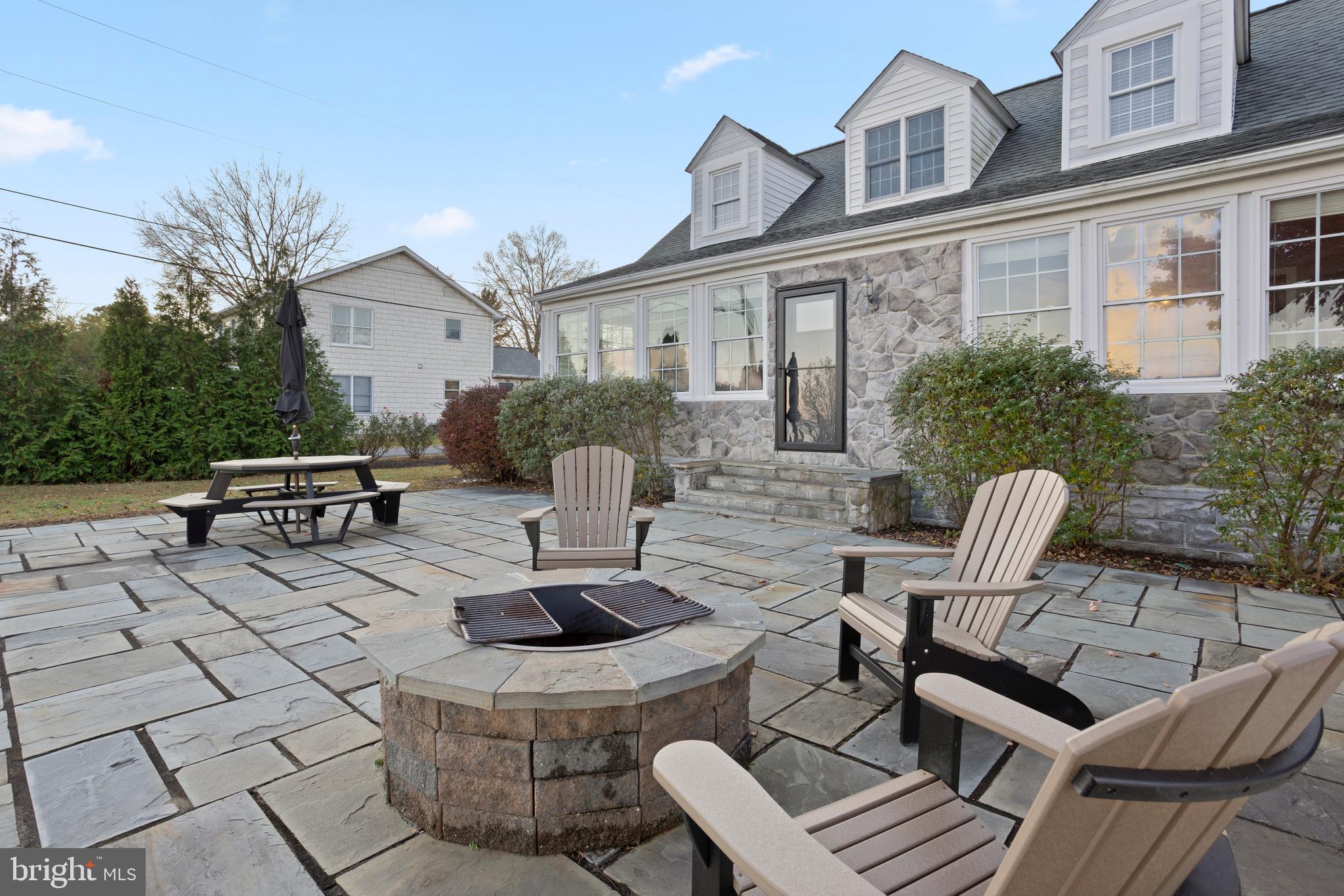 3930 Oyster House Road Broomes Island, MD 20615 - Photo 7 of 43 Creekside Stone Patio with built-in fire ring
