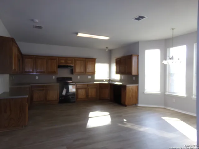 a large kitchen with lots of counter top space