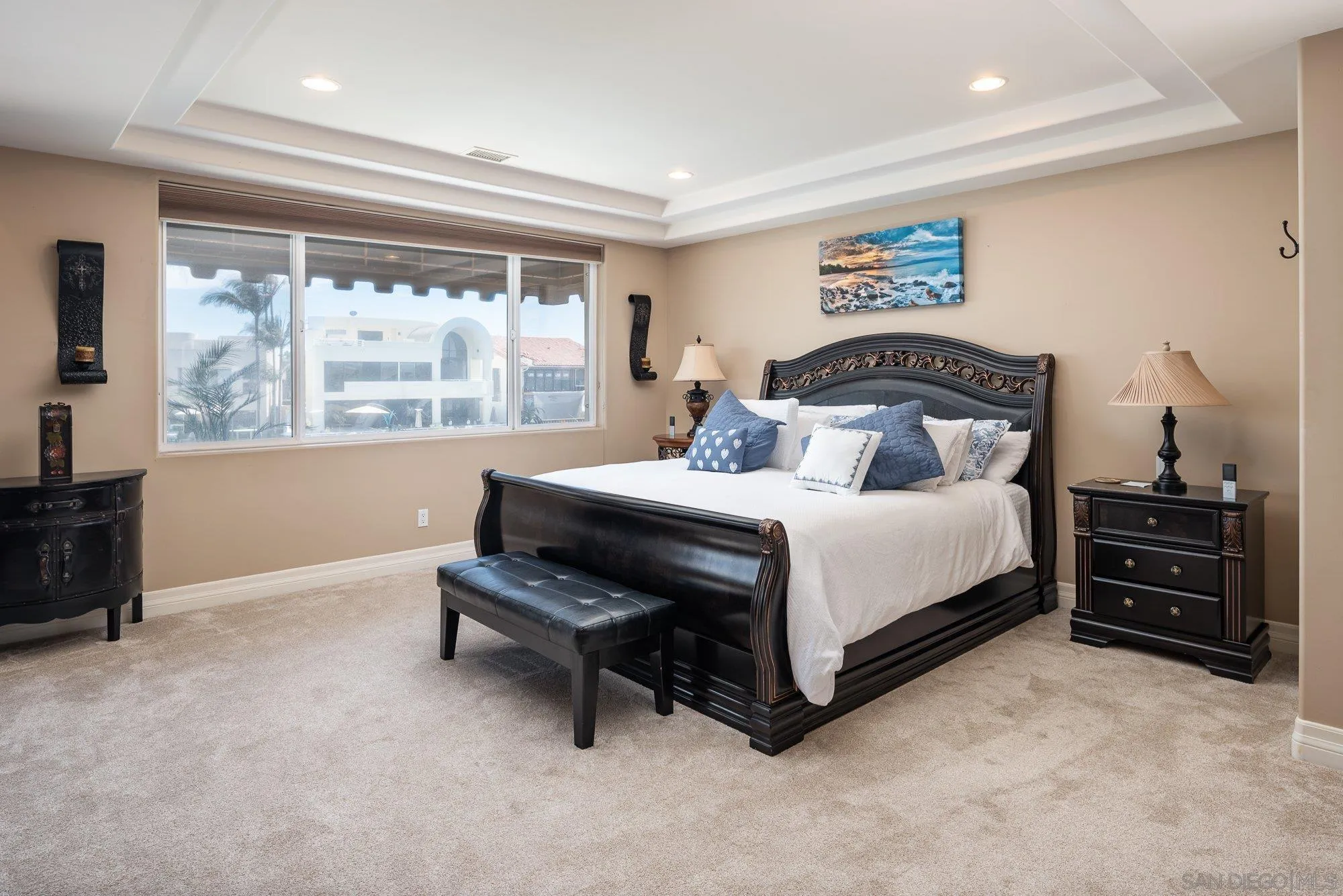 24 Sandpiper Strand Coronado, CA 92118 - Photo 16 of 56 a bedroom with a bed and a large window