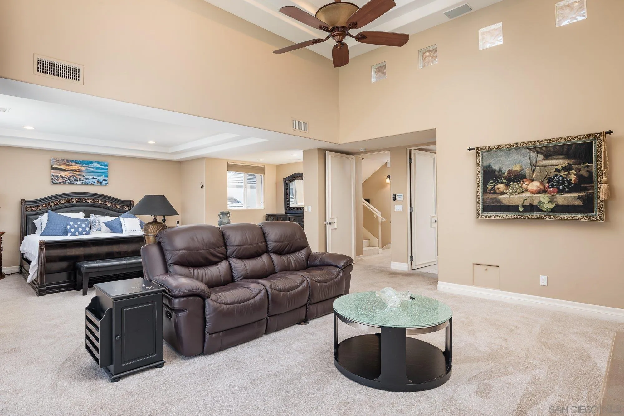 24 Sandpiper Strand Coronado, CA 92118 - Photo 21 of 56 a living room with furniture and a view of painting on the wall