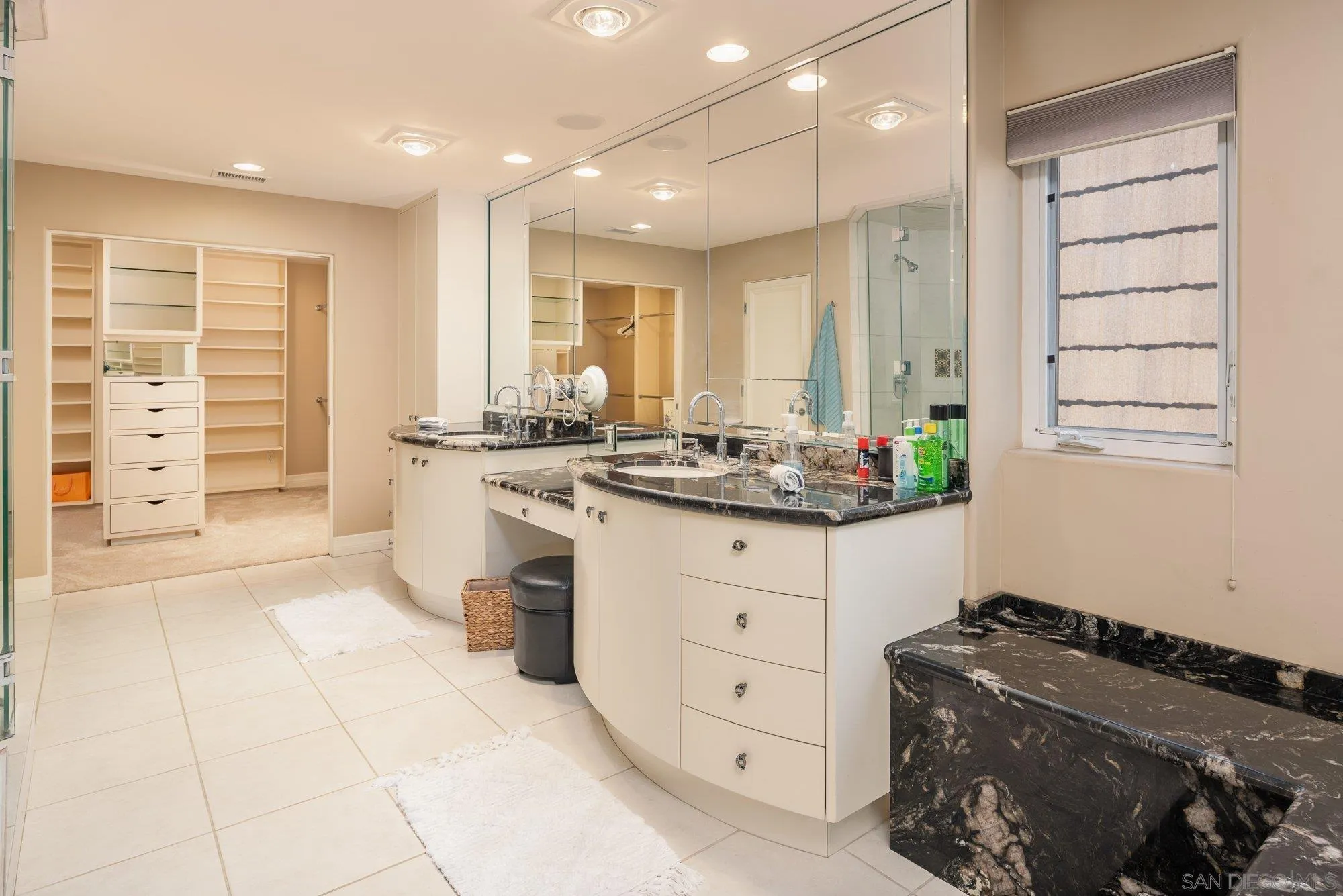 24 Sandpiper Strand Coronado, CA 92118 - Photo 22 of 56 a kitchen with a stove a faucet and a refrigerator