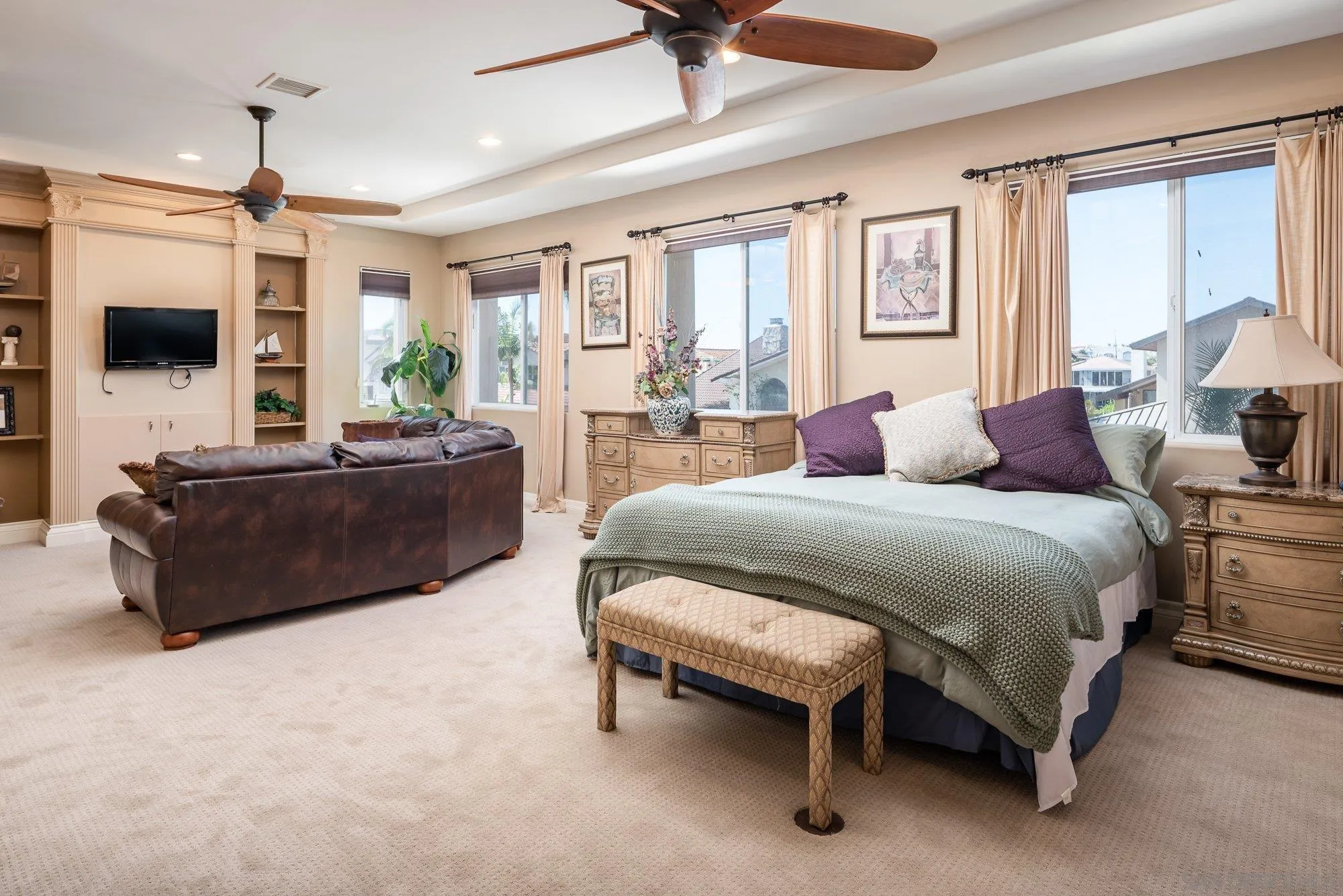24 Sandpiper Strand Coronado, CA 92118 - Photo 27 of 56 a spacious bedroom with a bed and a couch