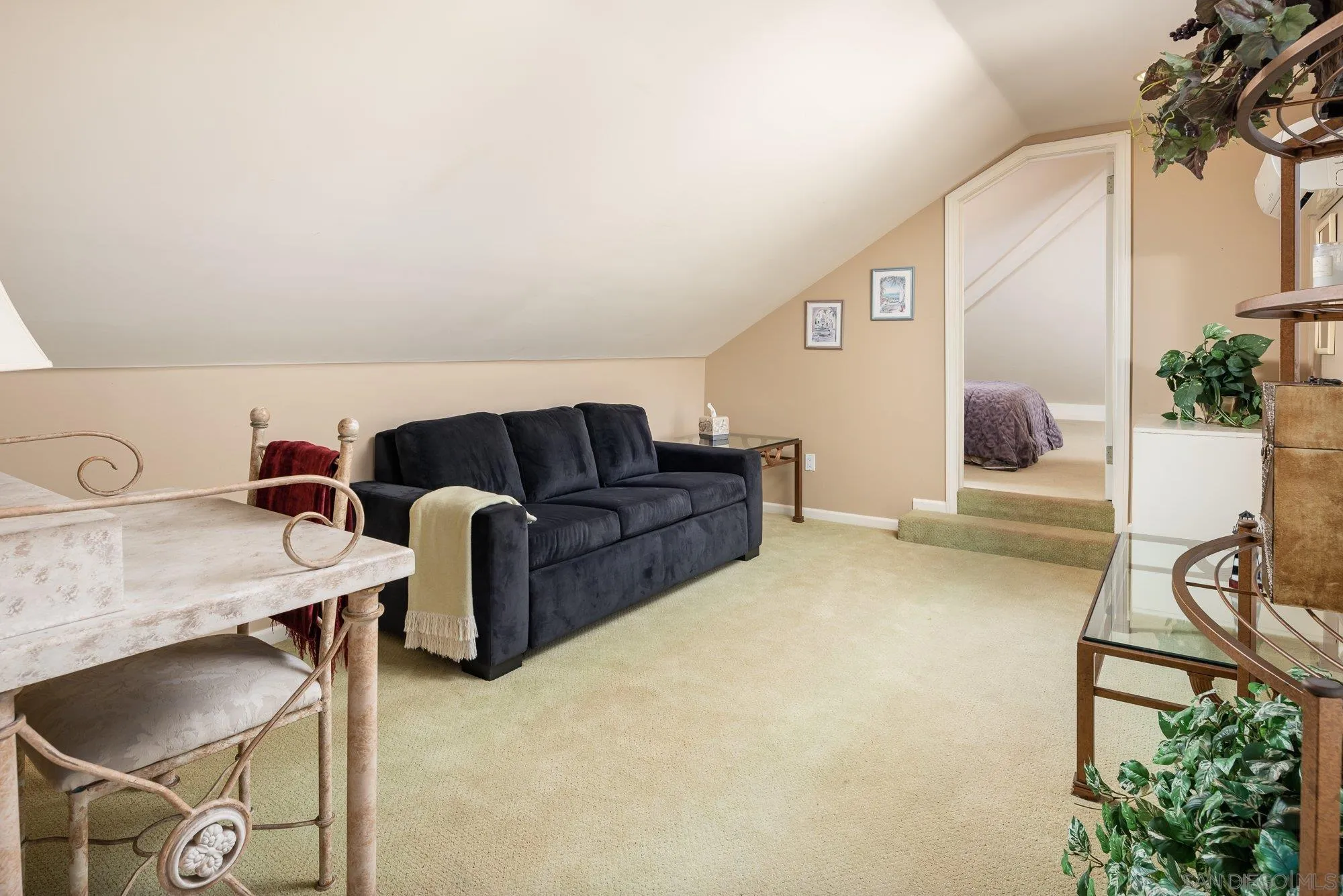 24 Sandpiper Strand Coronado, CA 92118 - Photo 29 of 56 a living room with furniture and a potted plant