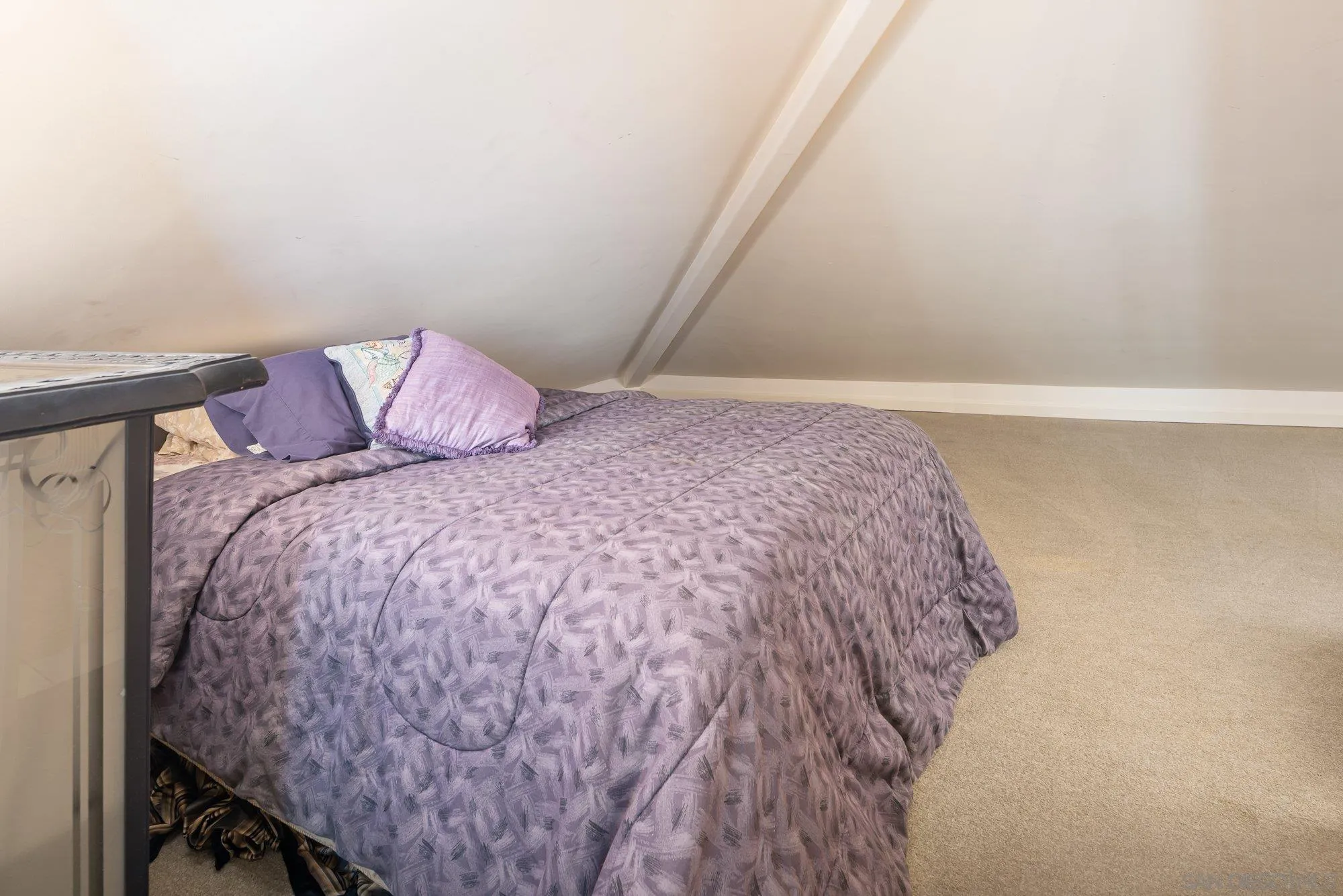 24 Sandpiper Strand Coronado, CA 92118 - Photo 30 of 56 a bed sitting in a bedroom next to a window