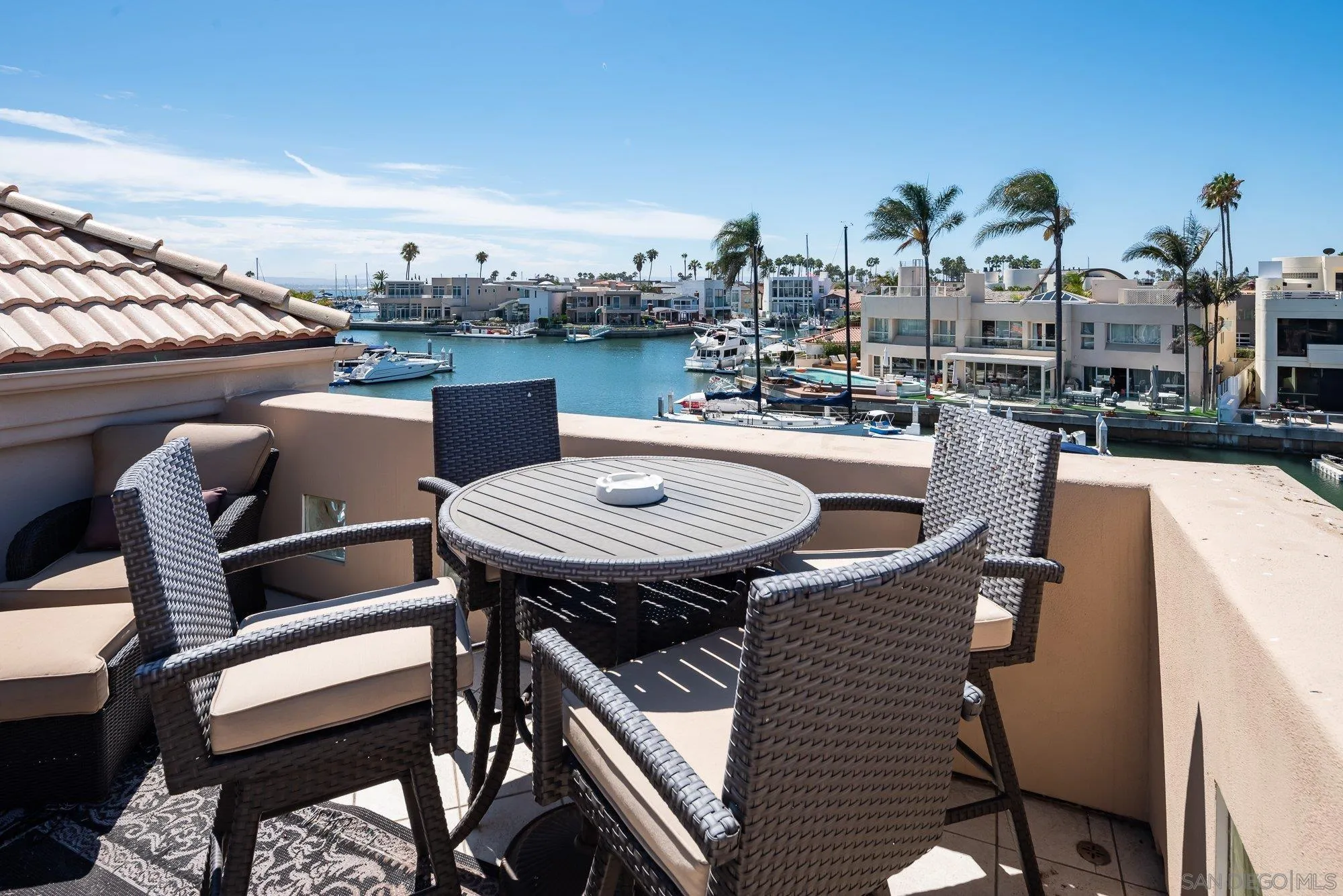 24 Sandpiper Strand Coronado, CA 92118 - Photo 33 of 56 a view of a chairs and table in patio