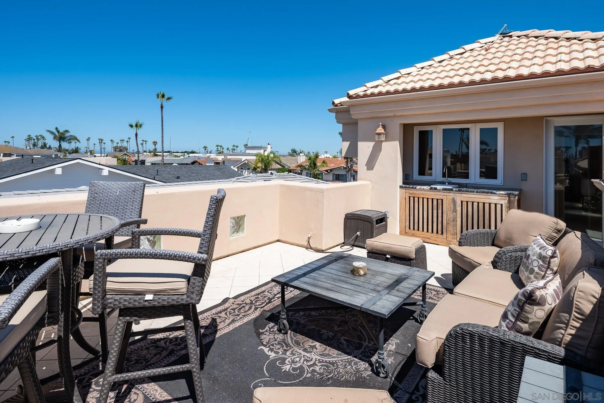 24 Sandpiper Strand Coronado, CA 92118 - Photo 36 of 56 a view of a patio with couches table and chairs