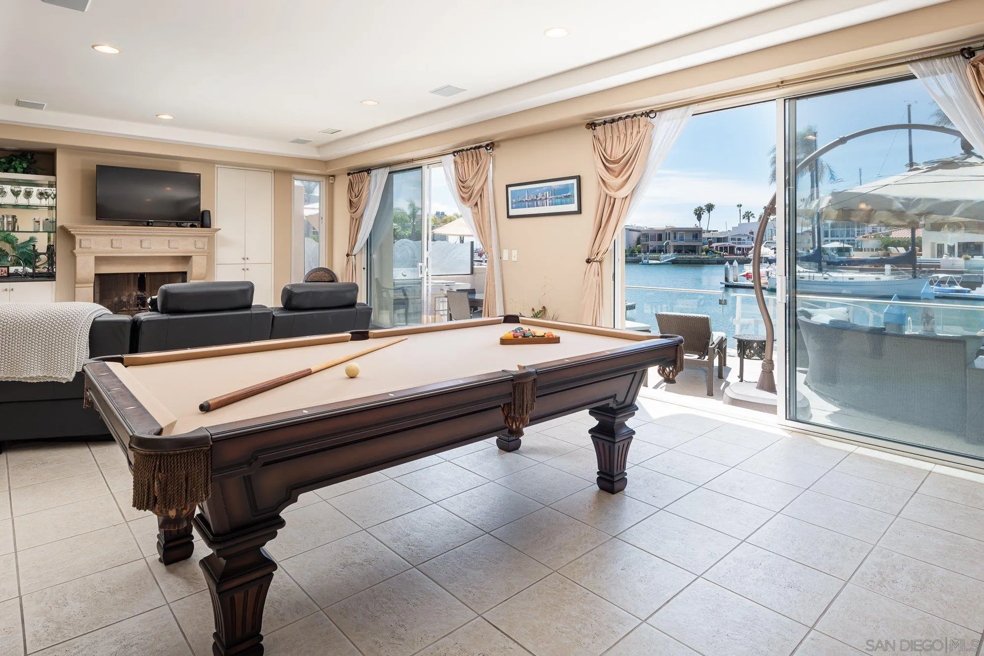 24 Sandpiper Strand Coronado, CA 92118 - Photo 4 of 56 a room with pool table and windows