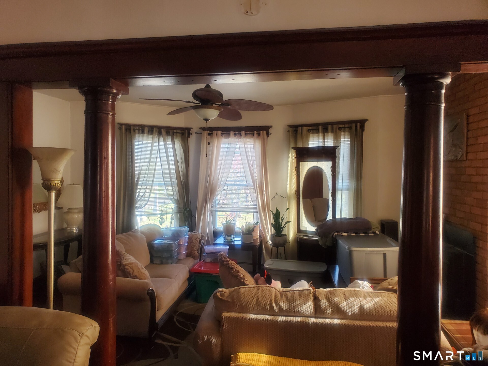 121 Pine Street New Haven, CT 06513 - Photo 4 of 8 a living room with furniture and a large mirror