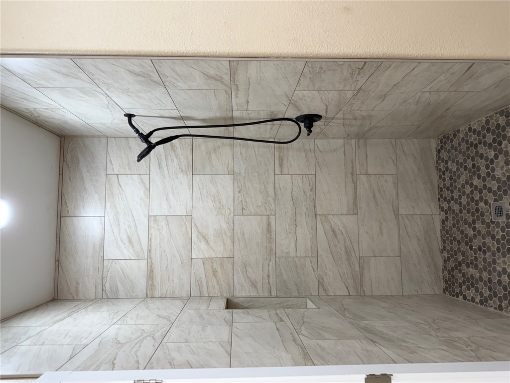 807 South Coulter Drive Bryan, TX 77803 - Photo 11 of 17 a bathroom with a shower