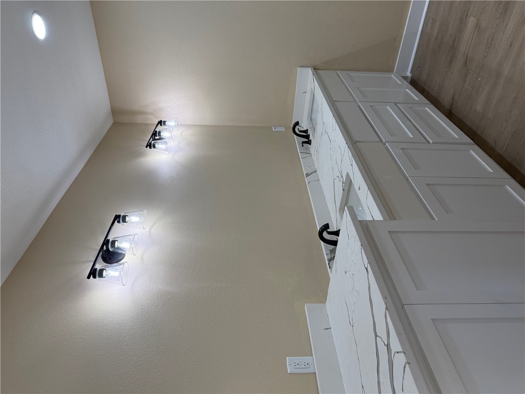 807 South Coulter Drive Bryan, TX 77803 - Photo 14 of 17 a bathroom with a sink and a mirror