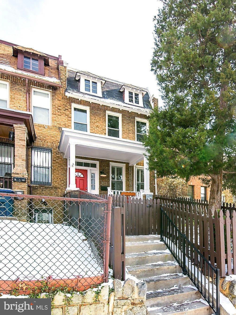2017 2nd Street Northeast Washington, DC 20002 - Photo 1 of 23 a front view of a house with parking