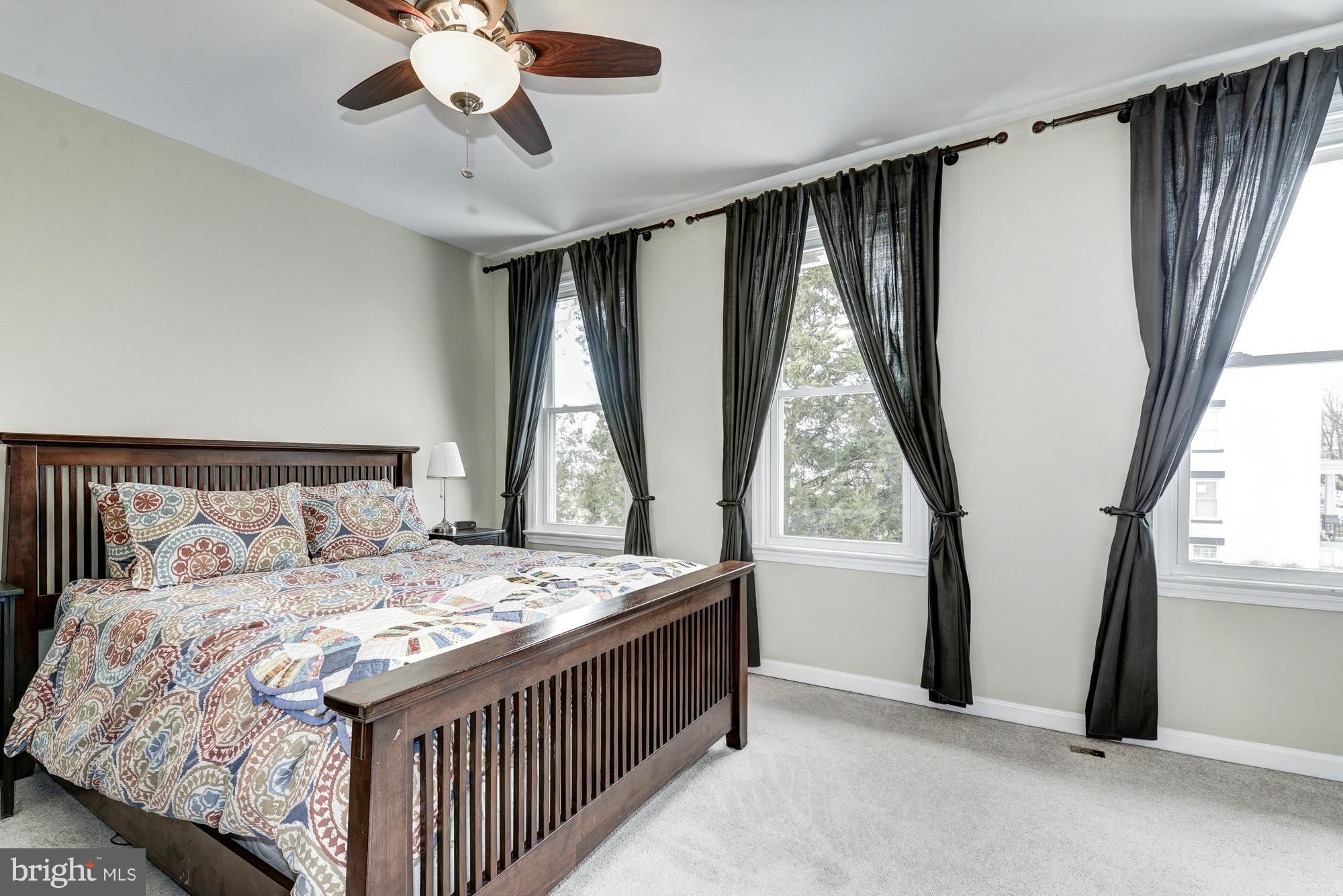 2017 2nd Street Northeast Washington, DC 20002 - Photo 17 of 23 a bedroom with a bed and a large window