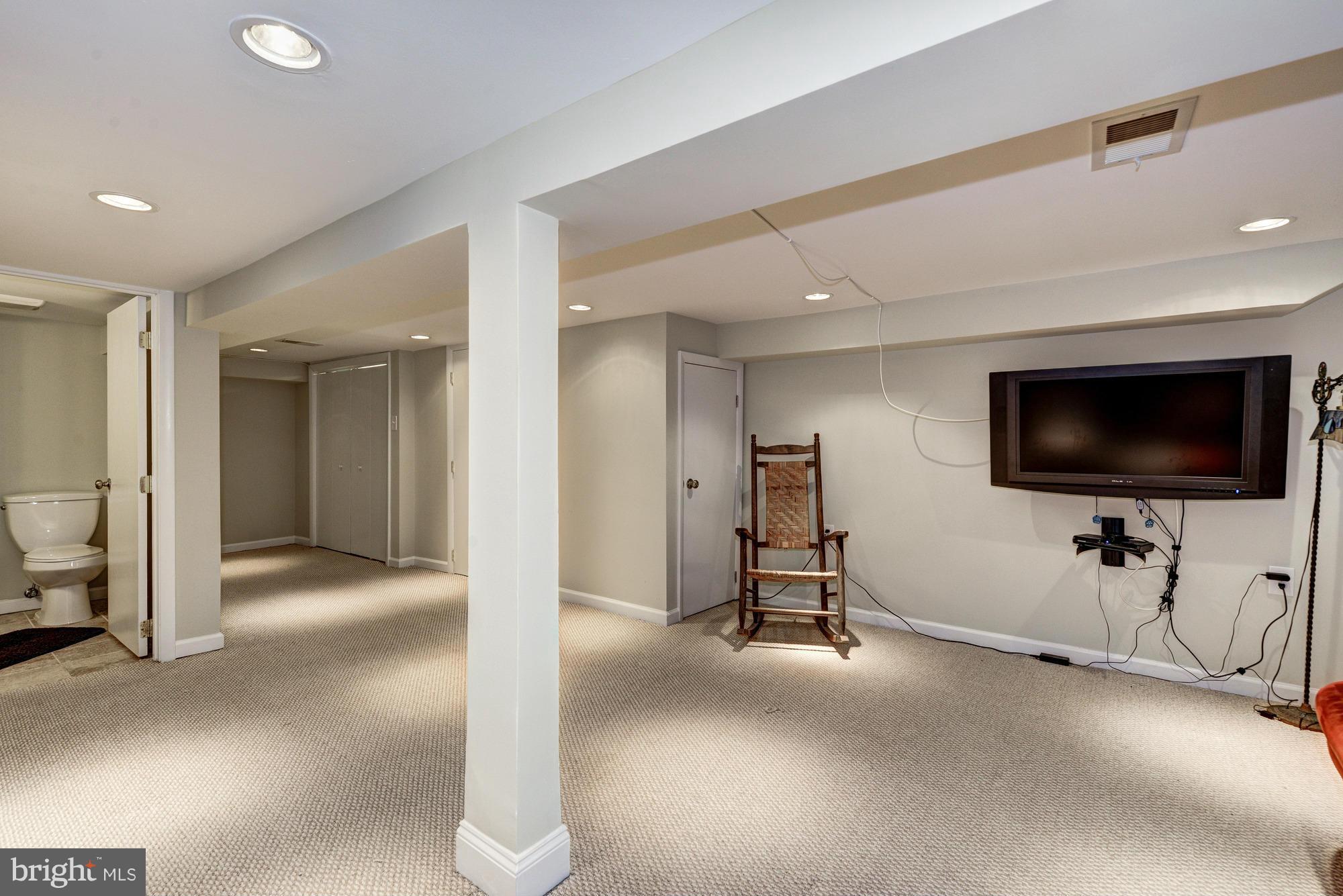 2017 2nd Street Northeast Washington, DC 20002 - Photo 20 of 23 a view of a livingroom with furniture and a flat screen tv