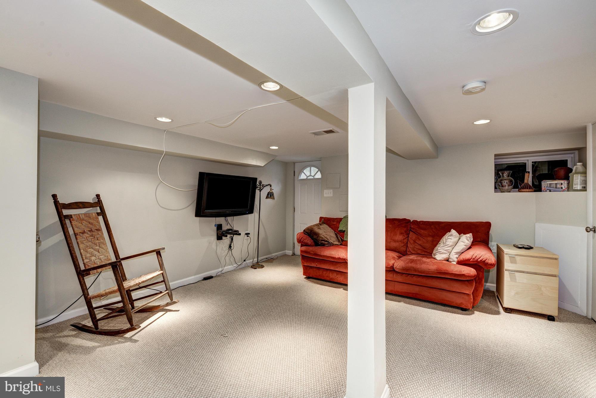 2017 2nd Street Northeast Washington, DC 20002 - Photo 21 of 23 a living room with furniture and a flat screen tv