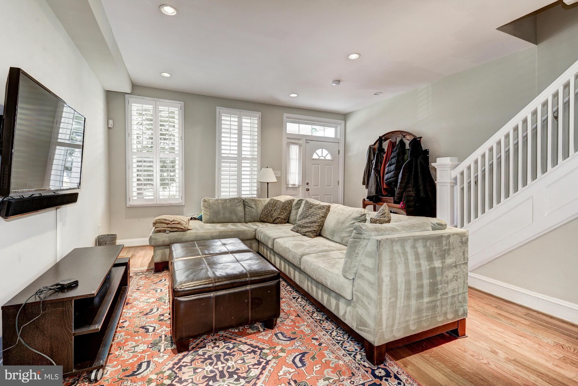 2017 2nd Street Northeast Washington, DC 20002 - Photo 4 of 23 a living room with furniture and a flat screen tv