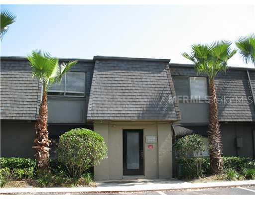 1940 South Conway Road, Unit 3 Orlando, FL 32812 - Photo 1 of 1 a front view of a house with garden
