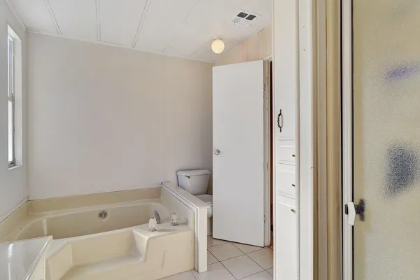 a bathroom with a sink and a bathtub
