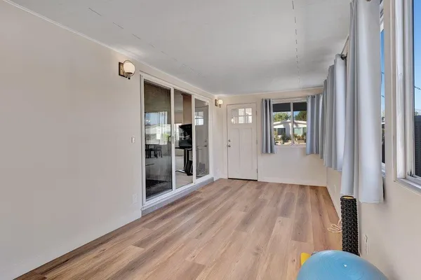 a view of livingroom with furniture and wooden floor