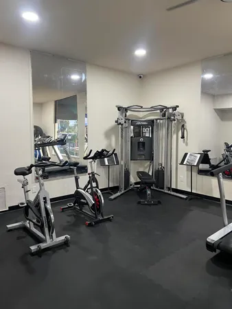 a view of a room with gym equipment
